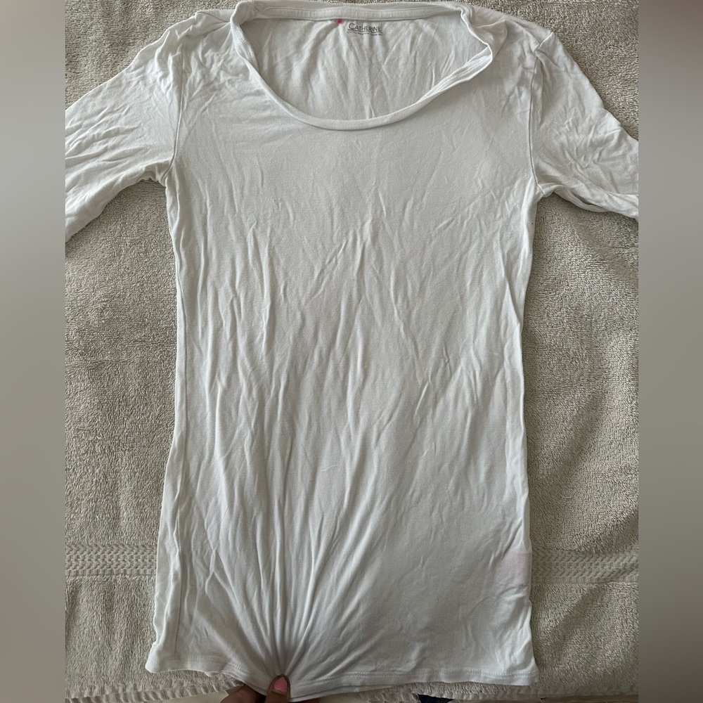Three white tshirts different brands